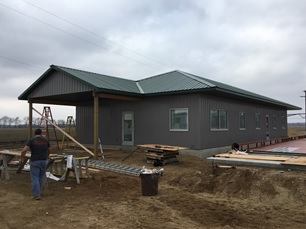 building under construction with siding.jpg